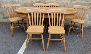 D-end pine kitchen table, 179cm x 83cm and a set of six beech slatback kitchen chairs, 76cm high (7)
