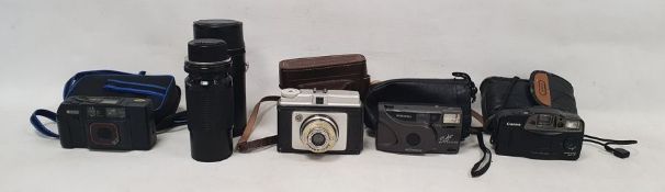 Tamron No.2 camera lens, a Cosina CT-1A camera, a Praktica Pentacon camera, an Ilford Sporti camera,