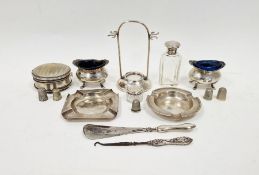 Pair of Edwardian silver condiment pots, of oval form raised on four paw feet, hallmarked Birmingham