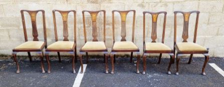Set of six mahogany floral and line inlaid dining chairs having pierced and inlaid splats, drop-in