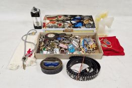 Quantity of souvenir keyrings from foreign venues, various American and other buckles, belts and