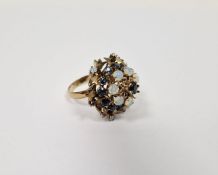 Gold-coloured metal, opal and blue stone cluster ring of four tiers (one opal missing)