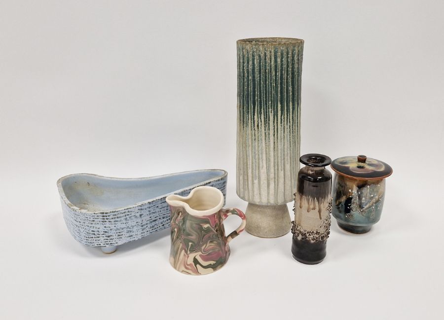 Stephen Parry-Thomas studio pottery jug with mottled red and green glaze on cream ground,