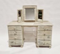 Grey painted dressing table with each section having four drawers, raised on bun feet, 77cm high x