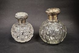 Two Edwardian silver mounted cut glass perfume bottles, each of globular form, hallmarked Birmingham