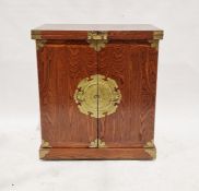 Contemporary Chinese cocktail bar with folding top and pair of opening doors to reveal fitted drinks