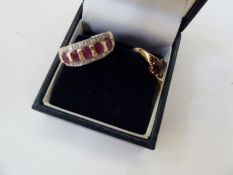 9ct gold, pink stone and diamond dress ring set five pink stones with two rows of small diamonds and