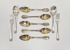 Set of five continental white metal tea spoons, with gilt bowls, together with two pairs of