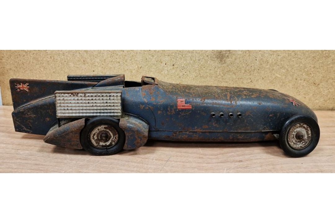 Kingsbury Bluebird clockwork tinplate landspeed record car with UK and USA flags to tail, Dunlop - Image 1 of 4