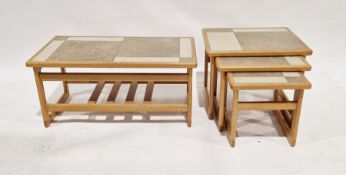 Nest of three tile-top oak side tables of rectangular form, largest 42cm high x 54cm wide x 44cm