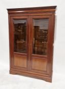 Modern stained wooden display cabinet, the two doors having bevel edged glass panels, 190cm high x