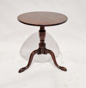 Georgian oak side table of circular form, raised on cabriole tripod legs, 54cm high x 50cm diameter