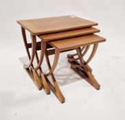 Mid century Nathan 'Citadel' teak nest of tables with curved 'x' frame supports, largest 51cm x 61cm