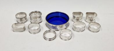 Selection of nine silver napkin rings, of various sizes and designs, together with a silver plated
