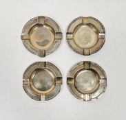 Matched set of four Irish silver ash tray, of circular form with Celtic style decoration to the