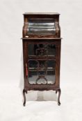 Late 19th/early 20th century stained wooden display cabinet, the top section with s-curved glass