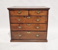 Georgian oak chest of drawers with two short drawers above three long graduated drawers, on