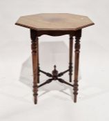 Victorian mahogany occasional table of octagonal form, raised on four tapering turned legs with a