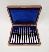 George V twelve-piece set of silver and mother of pearl cake knives and forks, hallmarked