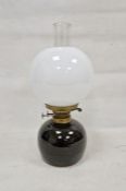 Oil lamp mounted on a Ray Finch (1914-2012), Winchcombe studio pottery, globular stoneware base,