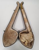 Carved meerschaum giant pipe the bowl carved with lions head, stylised floral carving to the handle,