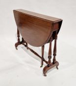 Victorian mahogany sutherland table raised on turned stretcher and legs, castors, 70cm high x 86cm