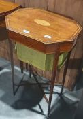 Edwardian mahogany sewing table of octagonal form with inlaid decoration throughout, raised on