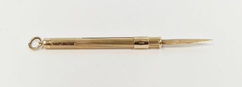 9ct gold propelling toothpick with engine-turned decoration