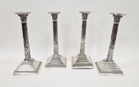 Set of four large Victorian silver candlesticks by Frederick Elkington, Corinthian columns on