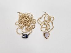 Multiple strand seedpearls with white metal blue enamel and paste set clasp (broken) and a gold-