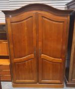 20th century continental armoire having two doors, 210cm high x 148cm wide x 63cm deep