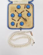 String of small pearls on 9ct gold clasp and a set of six blue enamel and silver-coloured metal