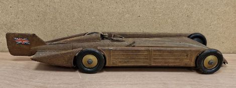 Kingsbury Golden Arrow clockwork tinplate landspeed record car with Uk flags to tail