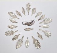 Danish Eiler & Merloe sterling seedpod and foliate brooch and a quantity of white metal leaf-shapes,