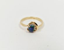 14ct gold and opal doublet ring set small oval stone in pierced setting