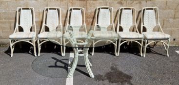 Contemporary painted bamboo-style dining table with circular glass top, 73cm high x 122cm diameter