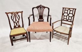 Late 19th/early 20th century mahogany armchair with pierced geometric decoration to a seat back,