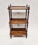 Victorian mahogany three-tier whatnot with four turned wooden finials and inlaid marquetry