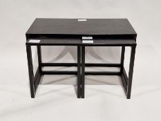 Nest of three Danish black painted side tables, possibly by Habitat, 50cm high x 85cm wide x 43cm