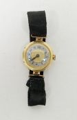 Early 20th century lady's 18ct gold cased wristwatch, the circular gilt dial having a mother of