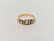 18ct gold, opal and diamond ring set three oval opals and six old cut diamonds  Condition Report