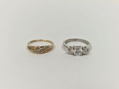 Silver three-stone dress ring set with three white stones and a 9ct gold and diamond ring,