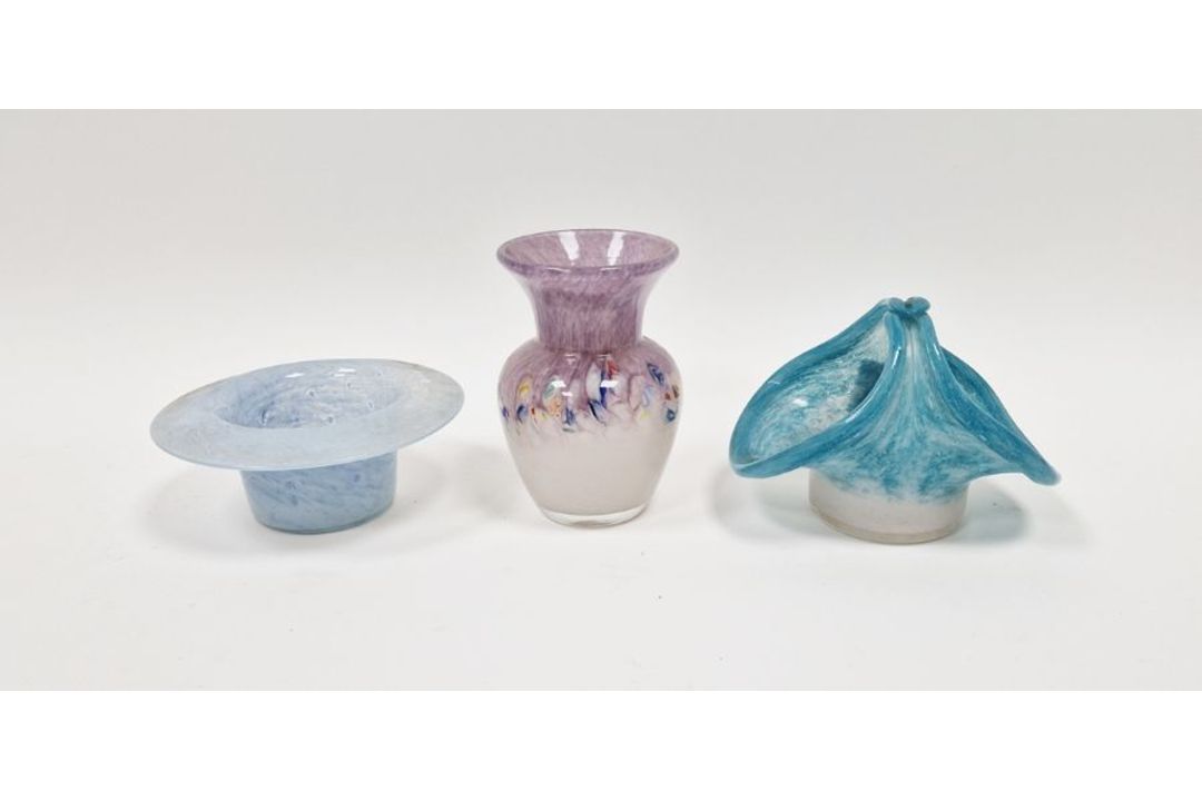 Three pieces of Vasart glass to include a vase with multi-coloured swirl decoration, a flared rim