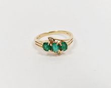 14ct gold, emerald and diamond dress ring set three oval emeralds and two small diamonds
