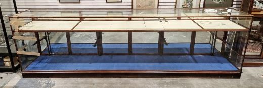 Large early 20th century mahogany jeweller's display cabinet by E Pollard & Co, having glazed front,