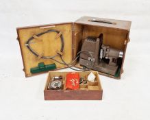 Vintage Kershaw model 250 slide projector, cased, applied with serial number 10523, the lens stamped