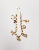 9ct gold charm bracelet, the oval and cross link bracelet with multiple gold and gold-coloured