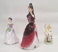 Royal Worcester figure of April modelled by F G Doughty, standing beside a lamb, printed black