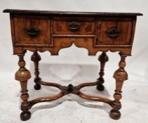 Late 17th/early 18th century walnut lowboy, the top having circular and quartered veneers with