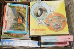 Large quantity of jigsaw puzzles, mainly railway related (4 boxes)